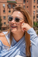 <em>Lunette de soleil pour elle</em>